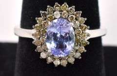 Elegant 1.2CTS Oval Cut Tanzanite & 0.60CTW Diamond Ring in Sterling Silver