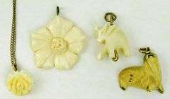 4 Vintage Carved Bone Pendants