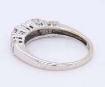 Dazzling White Gold Round Brilliant and Baguette Cut Diamond Band