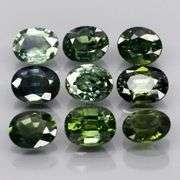Heated only! 4.44ct blue green sapphire set