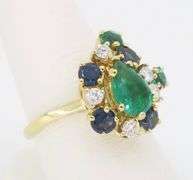 Emerald, Sapphire, and Diamond Cocktail ring in 18k Yellow Gold
