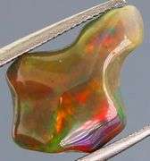 High fire collectors 2.21ct free form black Opal vein
