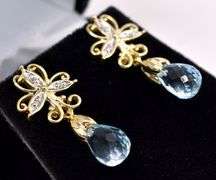 Magical Blue Topaz and Diamond Stud Earrings In Yellow Gold