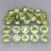 Fantastic 6.15ct diamond cut GREEN Sapphire set