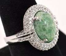 Beautiful 6.50CTS Emerald & 1.50CTW White Topaz Ring in Sterling Silver