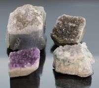 Attention grabbing 615ct Amethyst in Matrix set