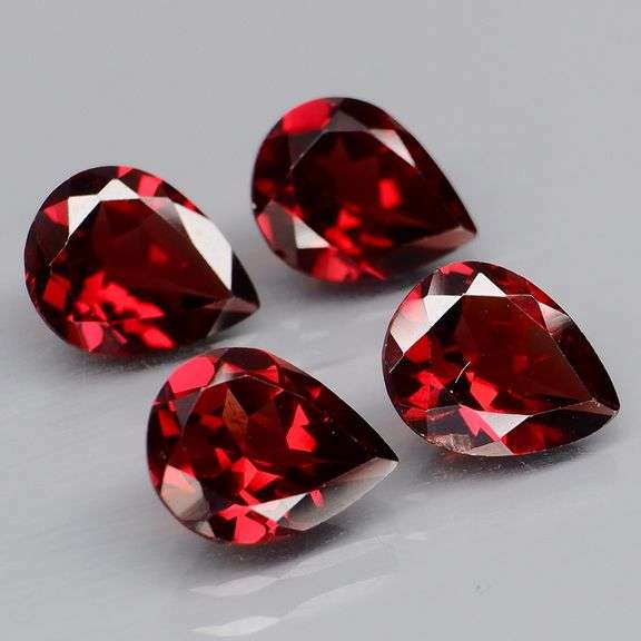 Premium 6.64ct pear cut cherry red Garnet set