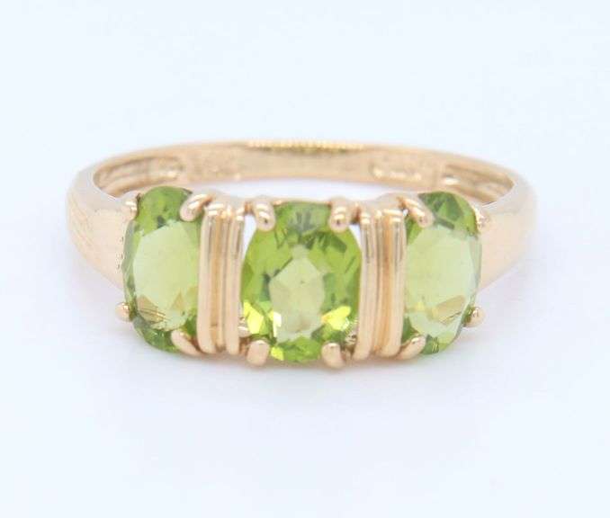 Gorgeous Yellow Gold Oval Peridot Three Stone Ring