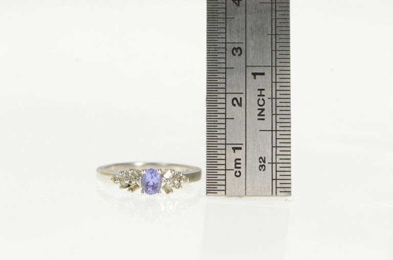 10K White Gold Oval Tanzanite Diamond Cluster Accent Ring