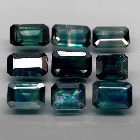 Heated only! 5.80ct blue green Sapphire set