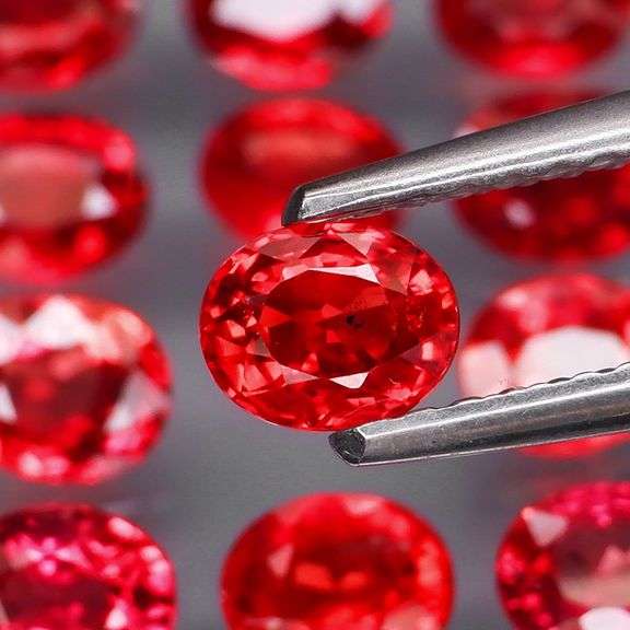 Brilliant 3.84ct fancy red orange Songean Sapphire set