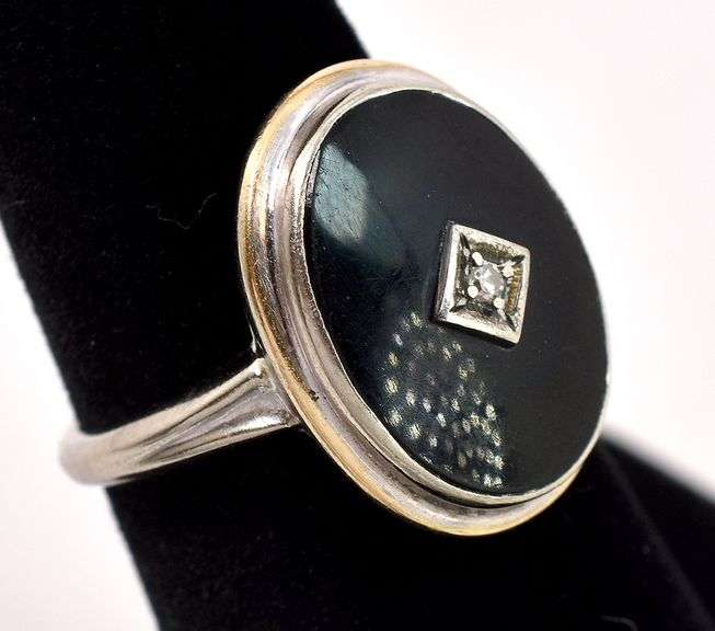 Stunning Diamond and Black Onyx Ring in White Gold
