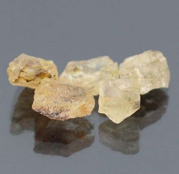 Untreated 10.40ct uncut Sunstone set