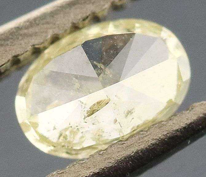 Sparkling .22ct oval cut yellow Diamond