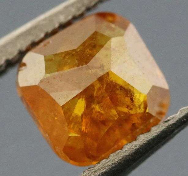 Stunning .39ct cushion cut amber Diamond