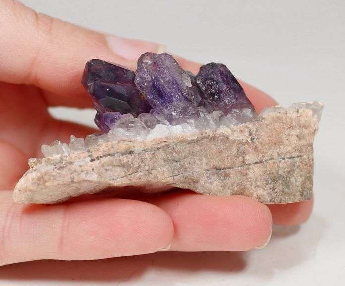Step-like 244.78ct natural Amethyst in matrix