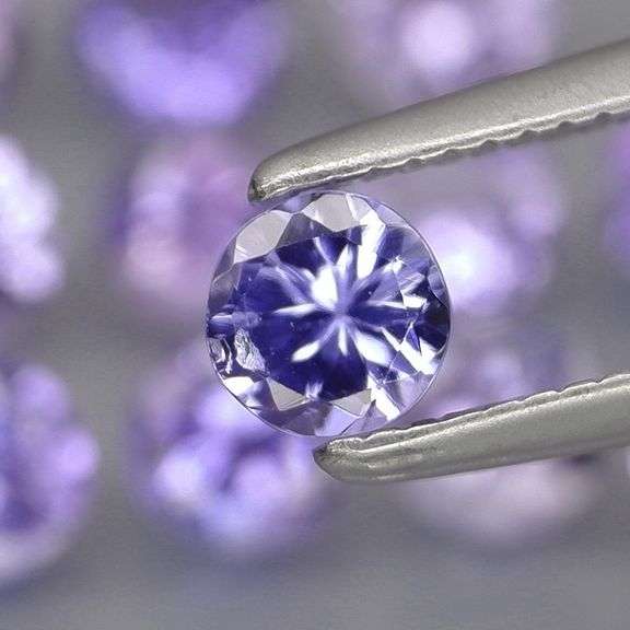 Glittering 3.29ct bright blue violet Tanzanite set