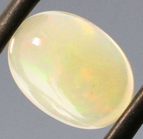 Magnificent 1.19ct full body flashing Semi Black Opal