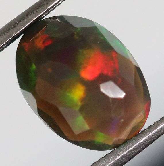 Fully faceted full panel flashing 1.92ct oval cut Black Opal