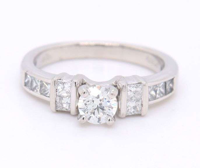 Brilliant Platinum Round in Princess Cut Diamond Setting Ring