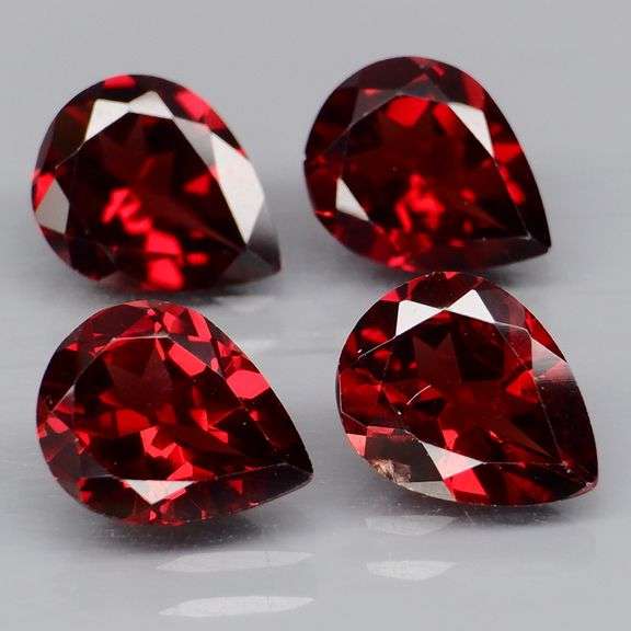 Premium 6.64ct pear cut cherry red Garnet set