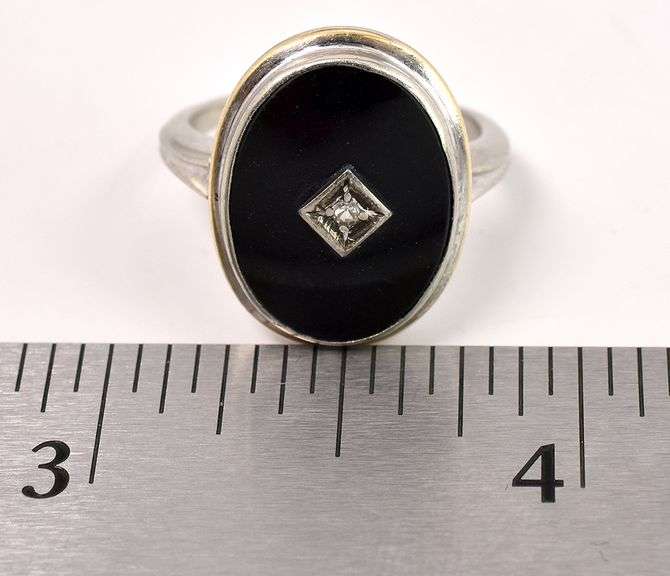 Stunning Diamond and Black Onyx Ring in White Gold