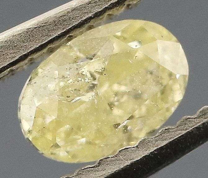 Sparkling .22ct oval cut yellow Diamond