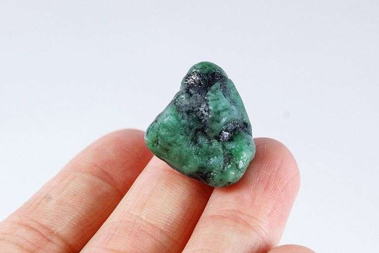 Very cool 27.8ct raw Emerald with matrix
