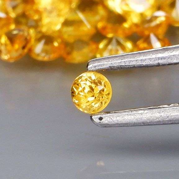 Incredible 3.69ct diamond cut yellow Sapphire set