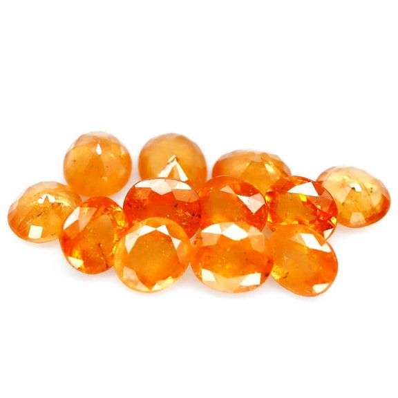 Exciting 8.32ct glowing orange Garnet set