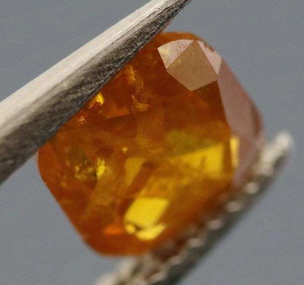 Stunning .39ct cushion cut amber Diamond