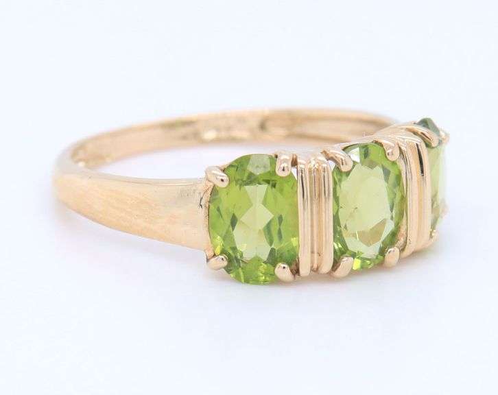 Gorgeous Yellow Gold Oval Peridot Three Stone Ring