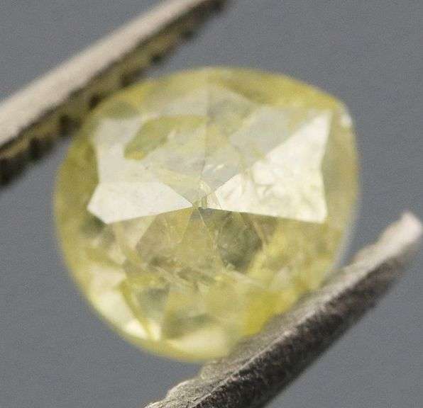 Sparkling .37ct pear cut yellow Diamond