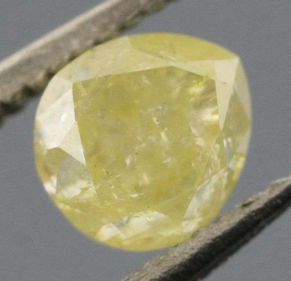 Sparkling .37ct pear cut yellow Diamond