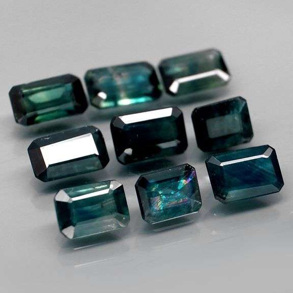 Heated only! 5.80ct blue green Sapphire set