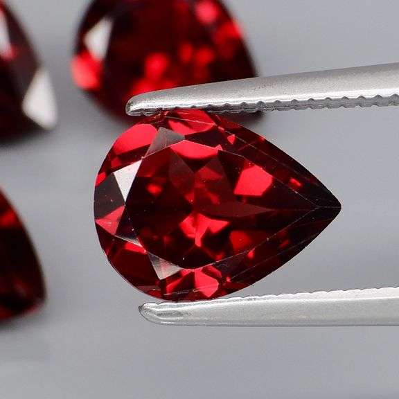 Premium 6.64ct pear cut cherry red Garnet set