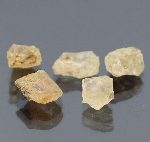 Untreated 10.40ct uncut Sunstone set