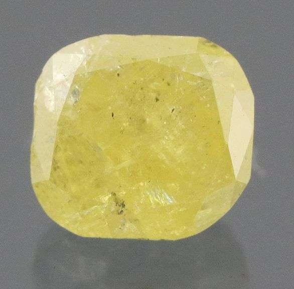 Nice .32ct cushion cut yellow Diamond