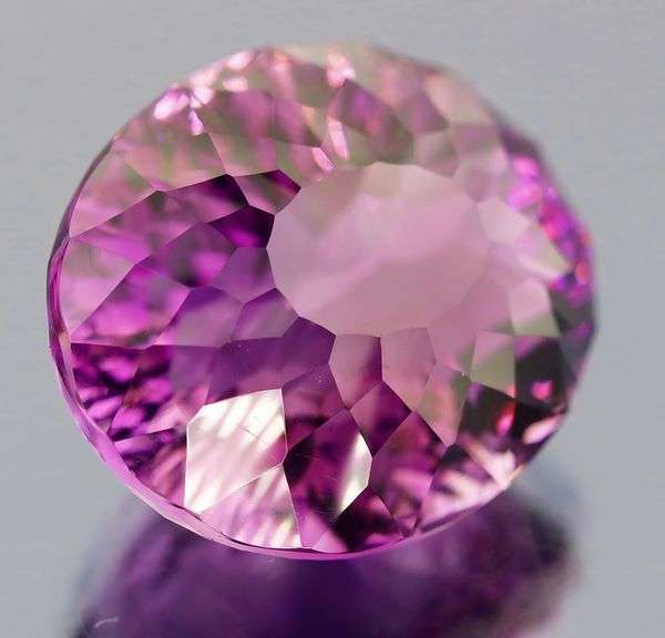 Giant! 37.50ct natural concave cut Amethyst
