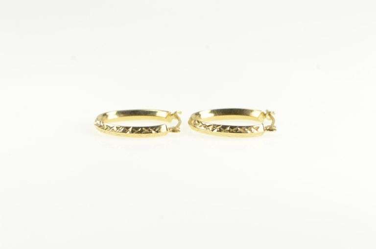 14K Yellow Gold 17.9mm Oval Textured Hollow Hoop Earrings