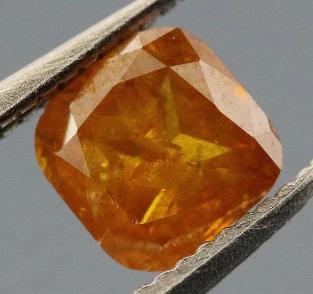 Stunning .39ct cushion cut amber Diamond