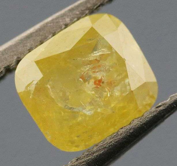 Glittering .32ct cushion cut golden yellow Diamond
