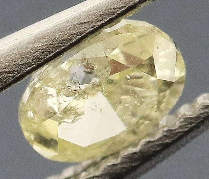 Sparkling .22ct oval cut yellow Diamond