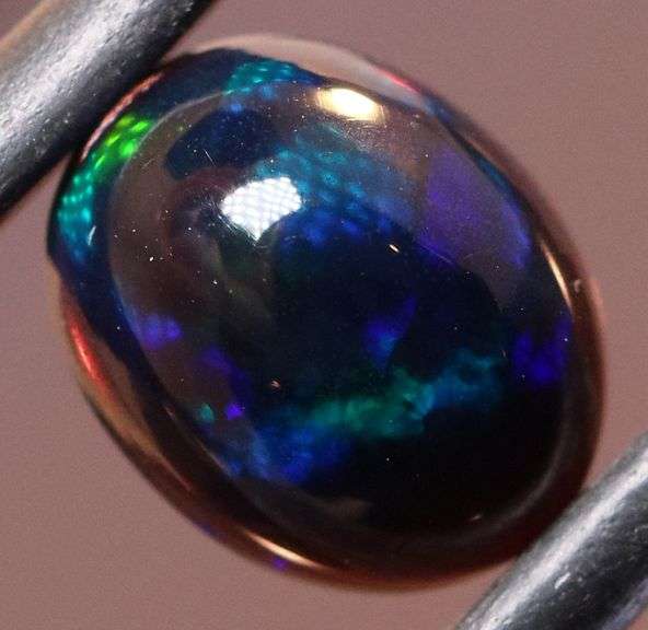 Magnificent 1.27ct blue and green flashing Black Opal