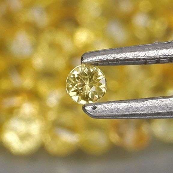Fantastic 5.43ct diamond cut yellow Sapphire set