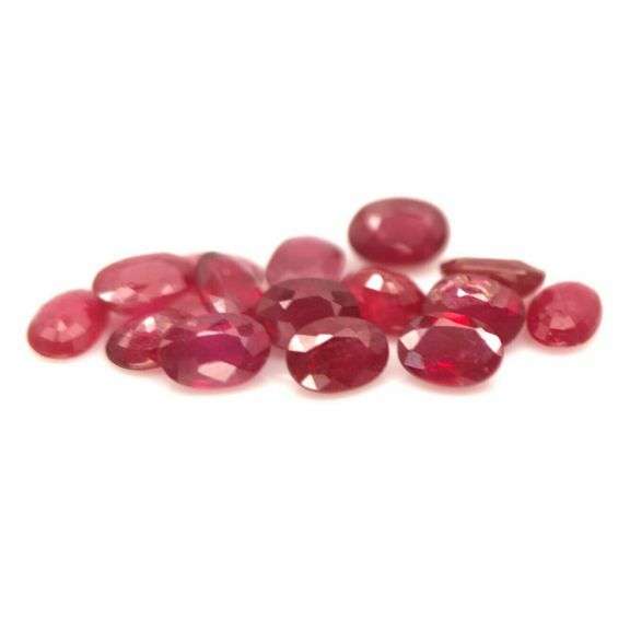 Rich 9.18ct oval cut imperial red Ruby set