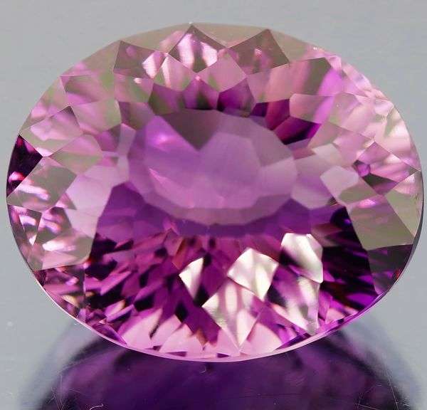 Giant! 37.50ct natural concave cut Amethyst