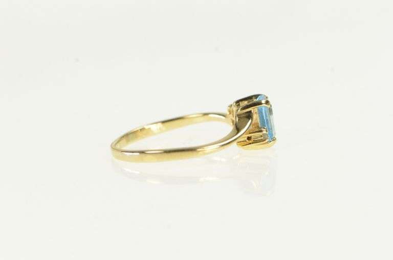 10K Yellow Gold Emerald Cut Blue Topaz Diamond Accent Ring
