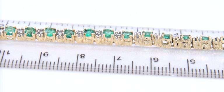 Handsome Yellow Gold Emerald and Diamond accent Bracelet
