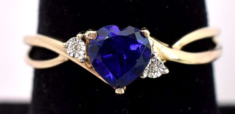 Adventurous Synthetic Blue Sapphire and Diamond Ring In Yellow Gold